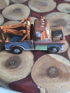 Pixar Cars Diecast and Plastic Tow Mater Truck